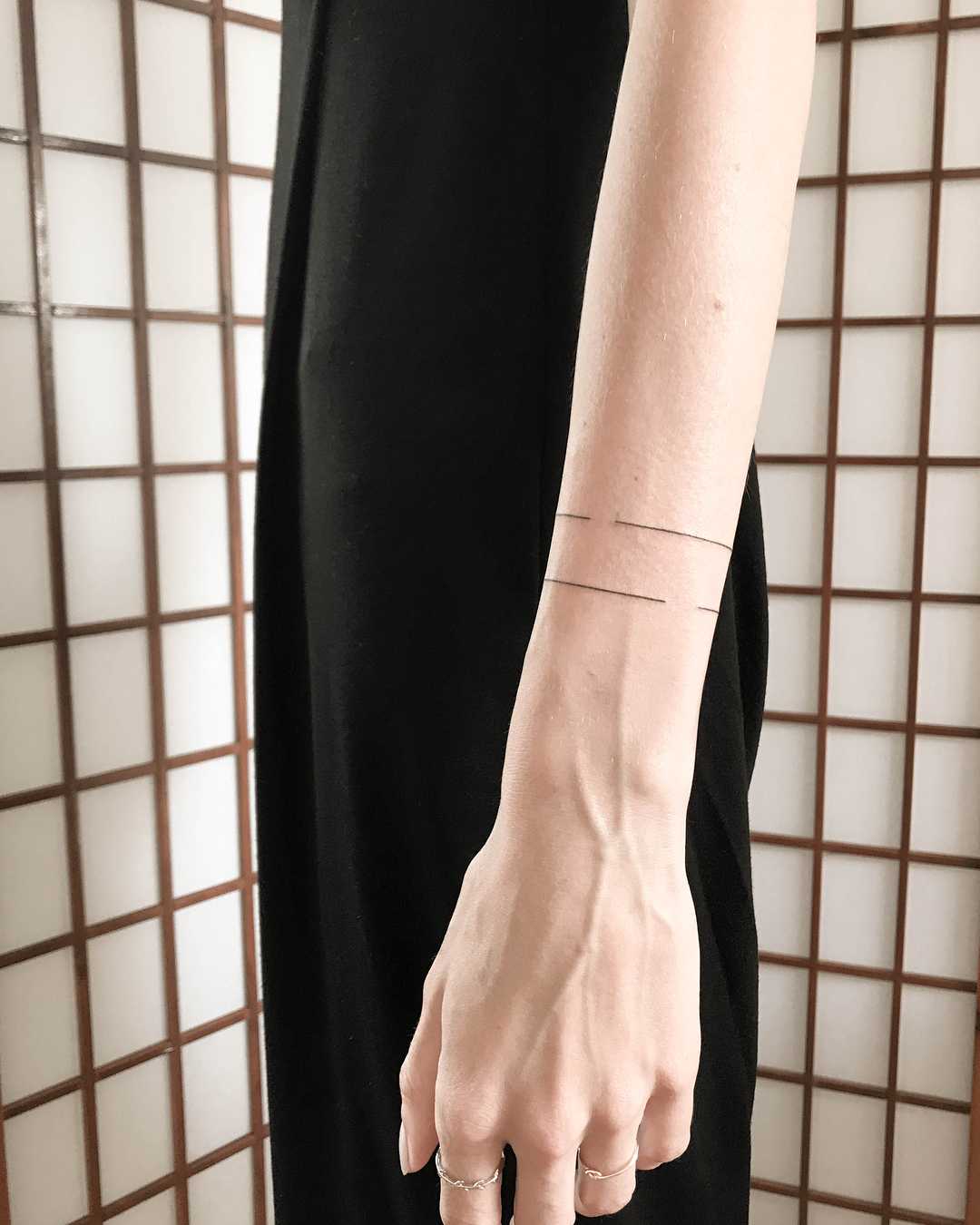 Wrap around with holes ️tattoo by Ann Gilberg