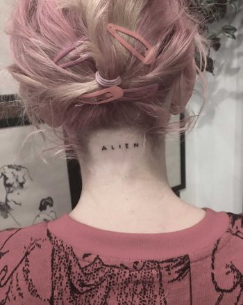 Alien tattoo by Robbie Ra Moore