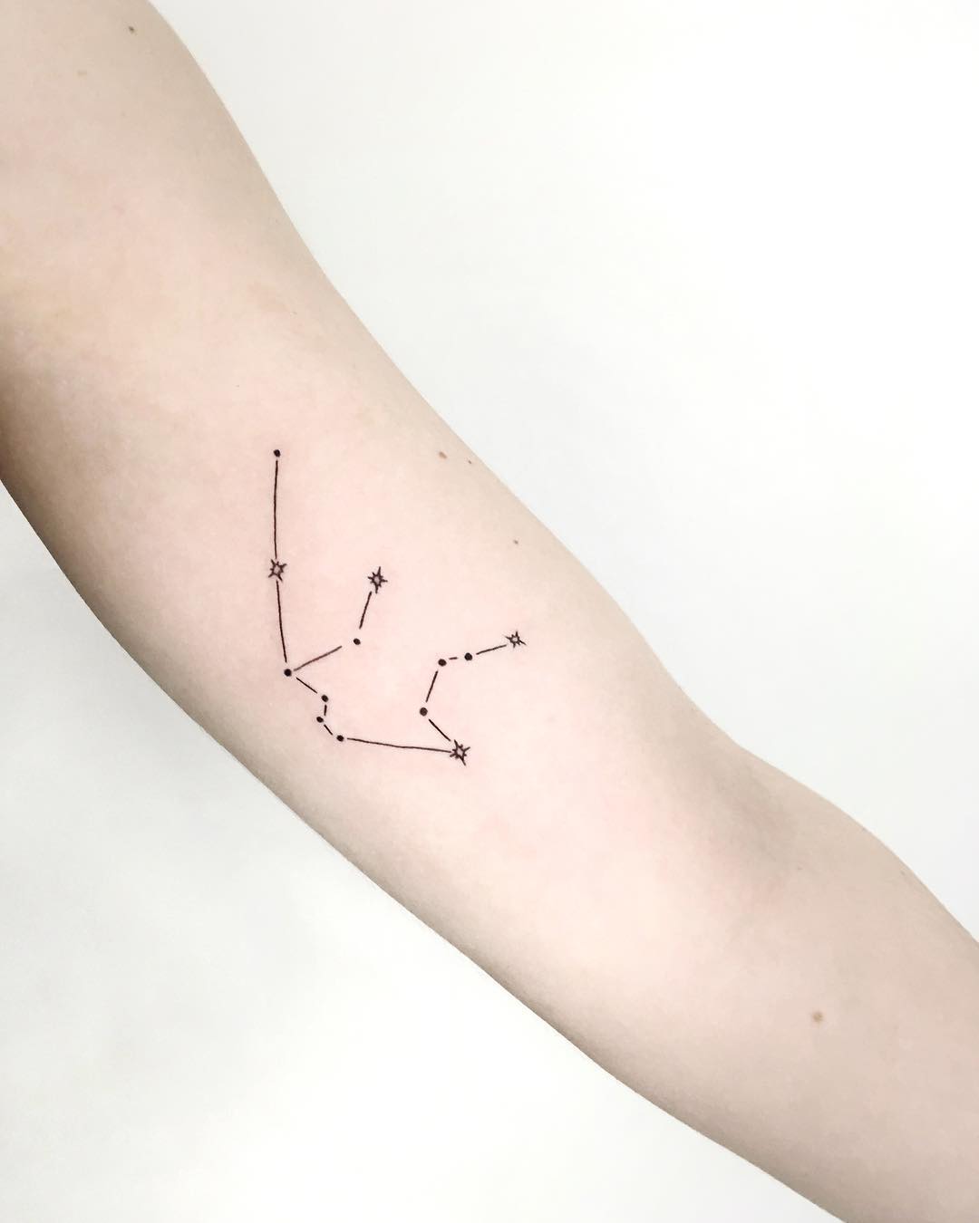 Aquarius constellation tattoo by Gianina Caputo