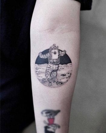 Astronaut on the moon tattoo by Aki Wong