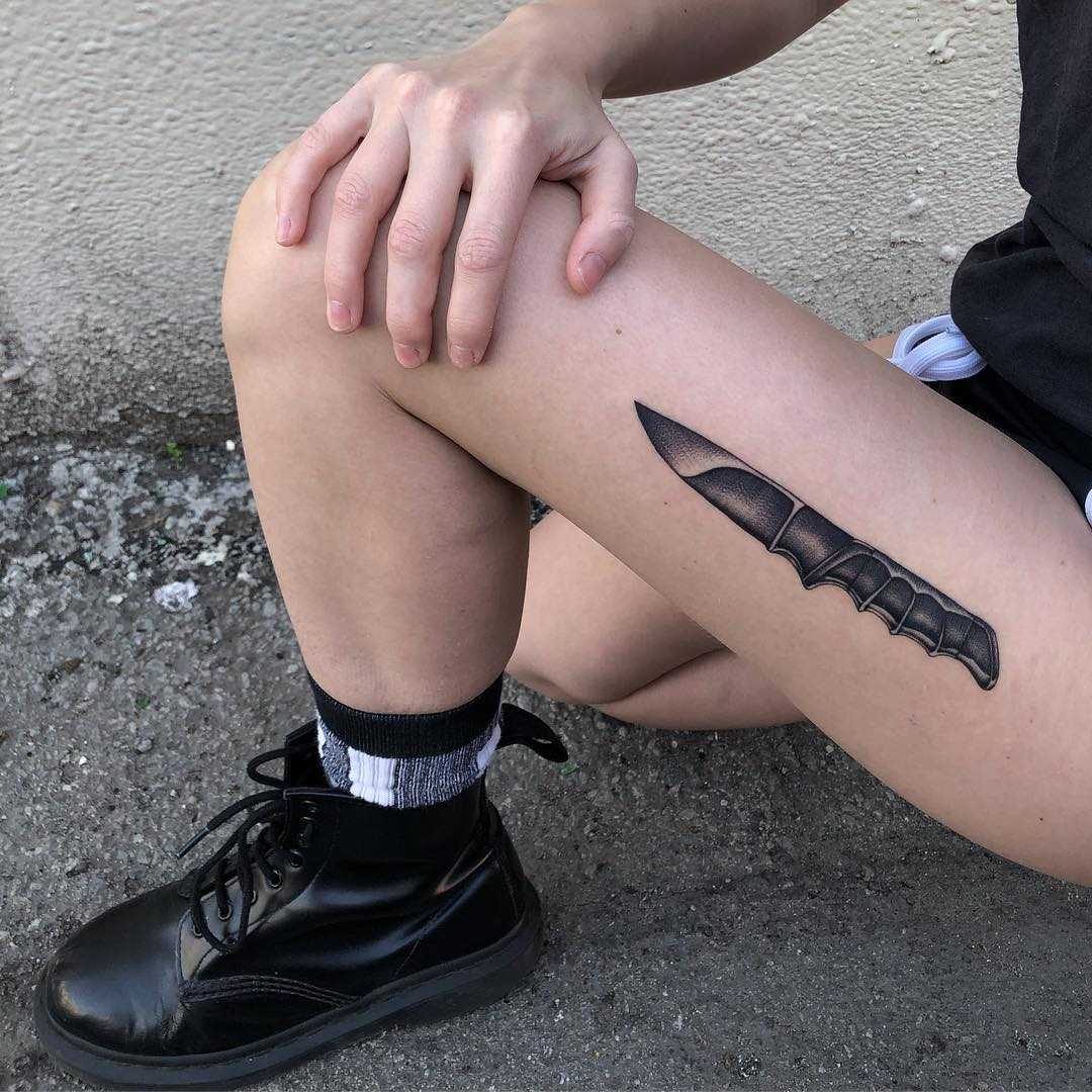 Awesome knife tattoo by Tine DeFiore