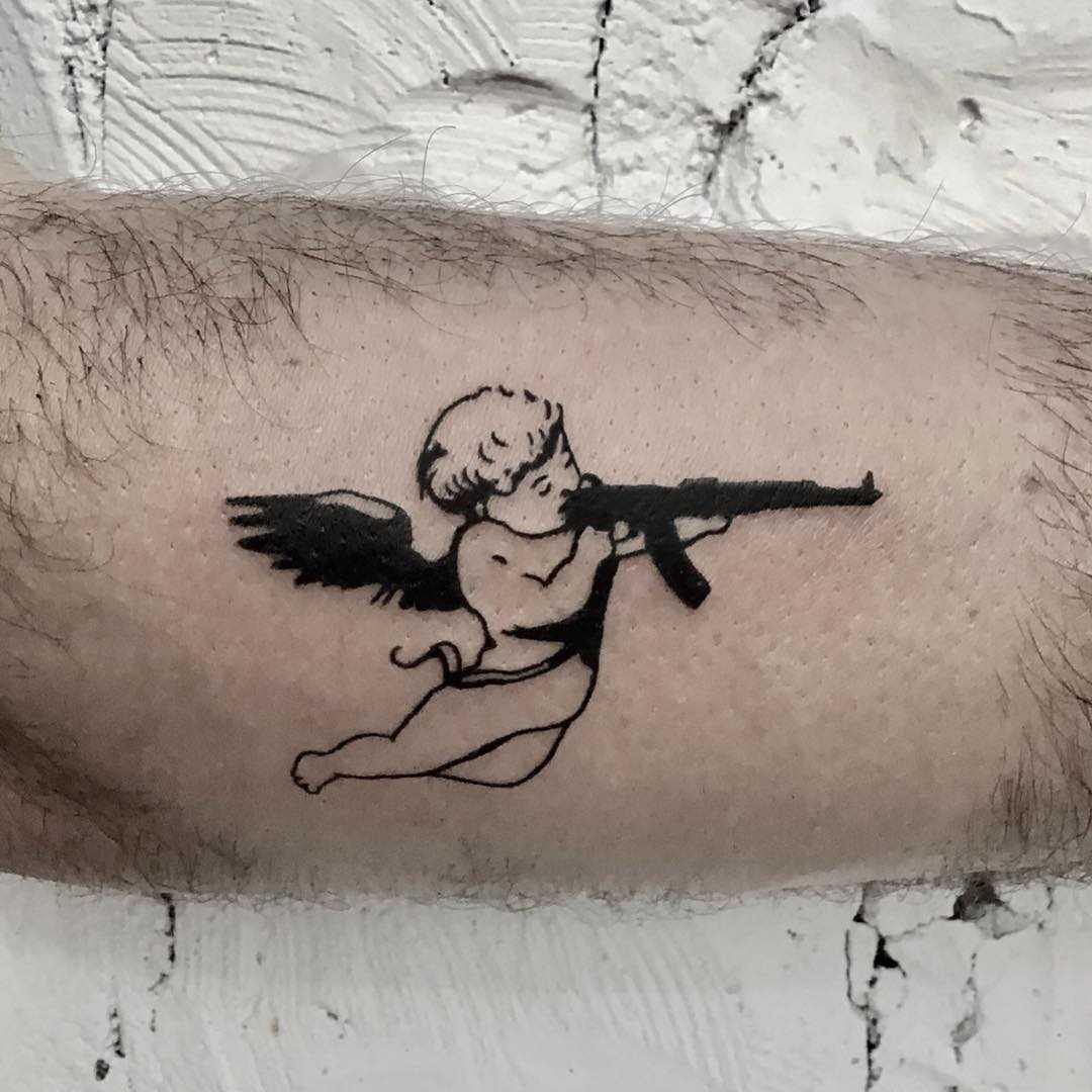 Bad angel tattoo by Kevin Jenkins