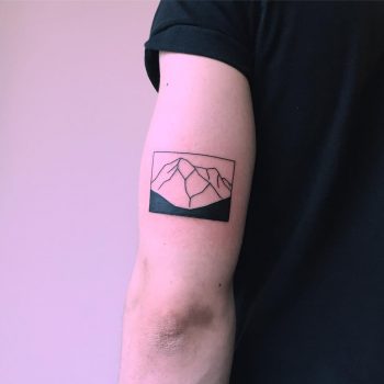 Black and white mountain tattoo by Chinatown Stropky