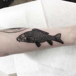 Black fishy tattoo by Deborah Pow