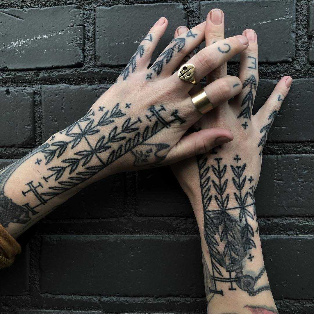 Black forearm patterns by Tine DeFiore