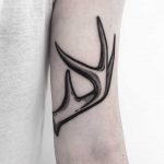 Blackwork antler tattoo by Pulled Poltergeist