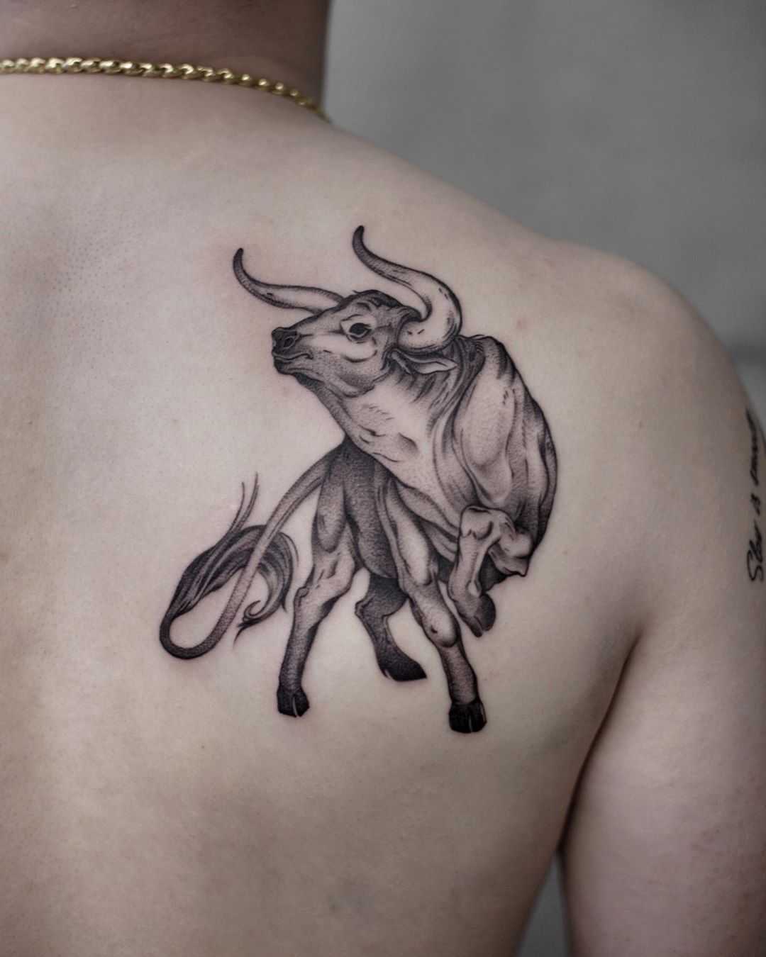 Bull tattoo by Aki Wong