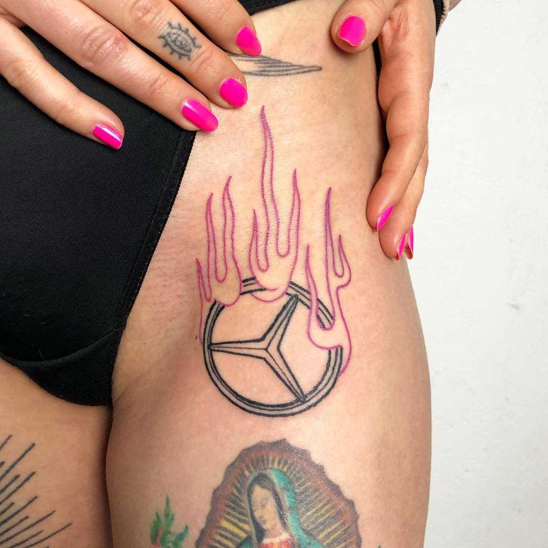 Burning Mercedes-Benz sign by Hand Job Tattoo