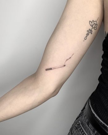Cigarette tattoo by Conz Thomas