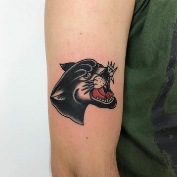 Classic panther head tattoo by Łukasz Krupiński