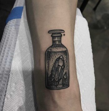 Crystals in a bottle by Tine DeFiore