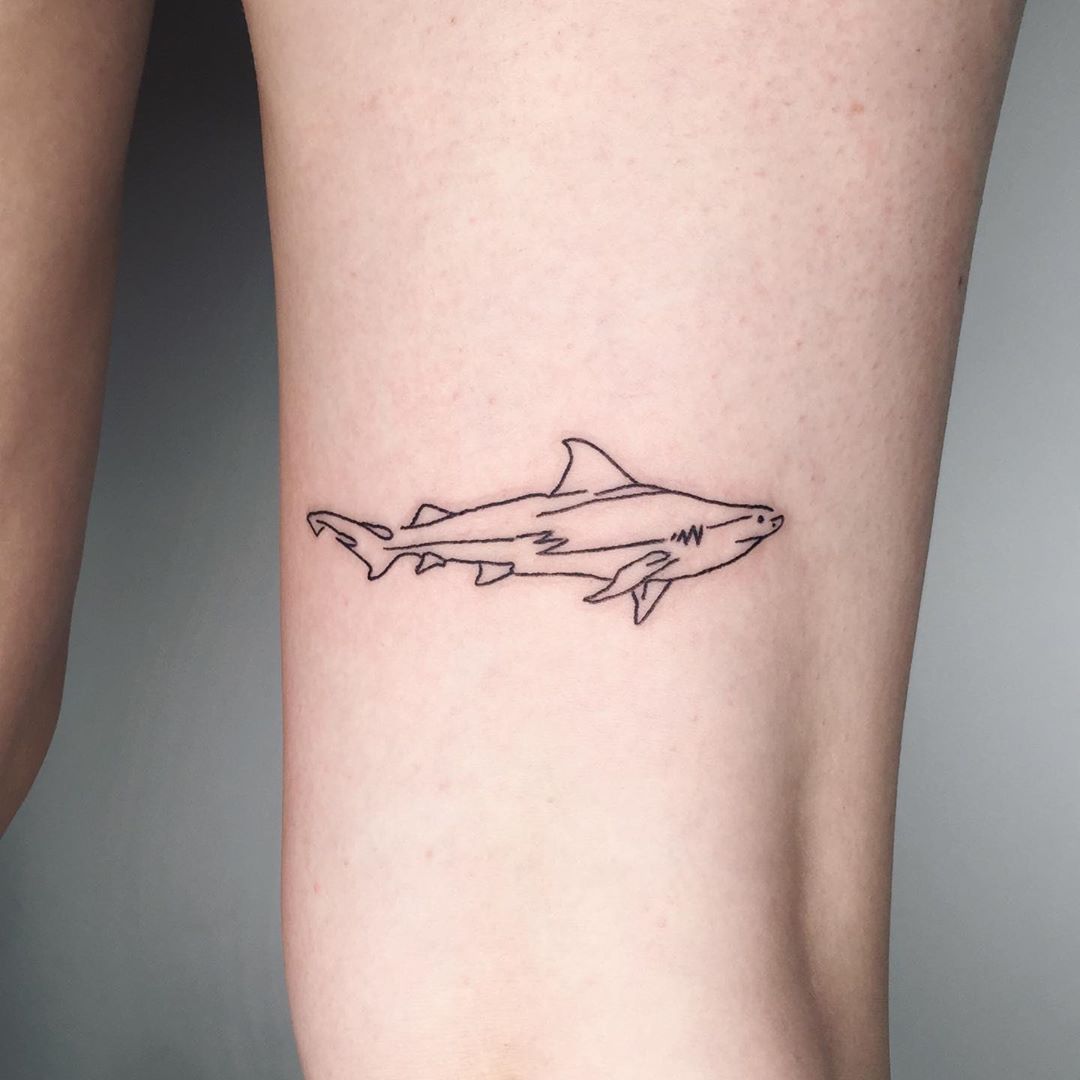 Cute shark tattoo by Suki Lune