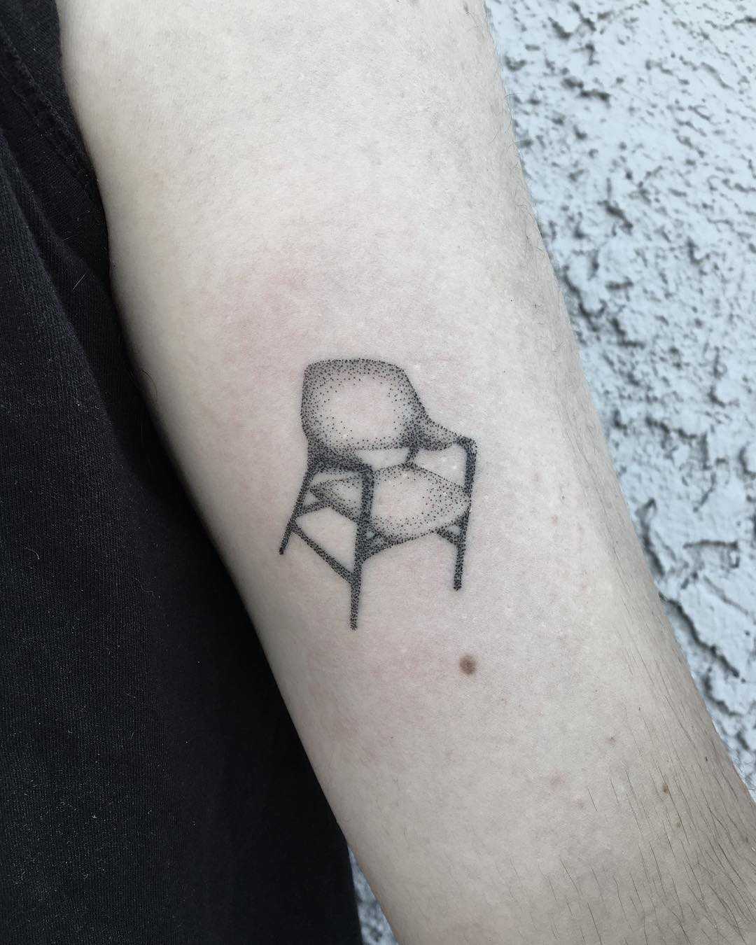 Dot-work chair tattoo by Robbie Ra Moore