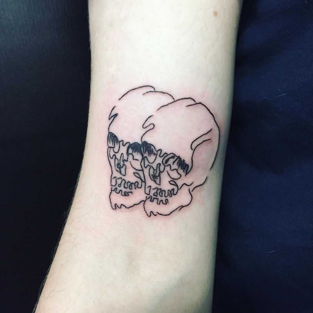 Double skull tattoo by Suki Lune