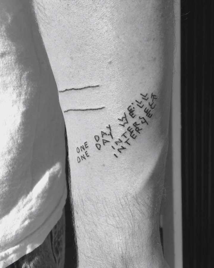 Double vision text tattoo by Robbie Ra Moore