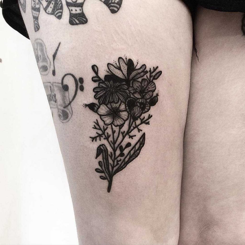 Floral Wreath Tattoo: Timeless Blossom Design for Body Art