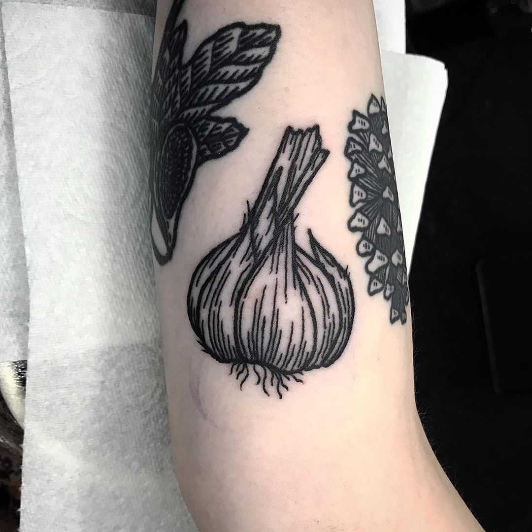 Garlic tattoo by Deborah Pow