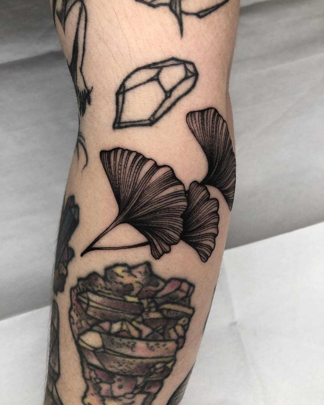 First one Inspired by the ginkgo tree located on the left side of my rib  cage Done by Ink and Destroy in Ohio sorry about the bad photo quality   rtattoos