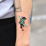 Hand-poked dancing alien tattoo by zzizziboy