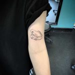 Hand-poked frog tattoo by Kirk Budden