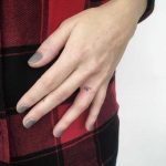 Hand-poked initials by Gianina Caputo