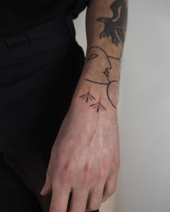 Hand-poked ornaments on the left wrist by Lara Maju