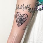 Heart-shaped spider web by Hand Job Tattoo