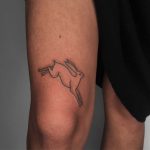 Jumping rabbit tattoo by Jessica Rubbish