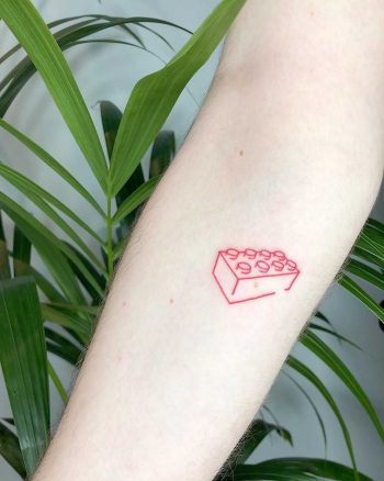 LEGO brick tattoo by Loz Thomas