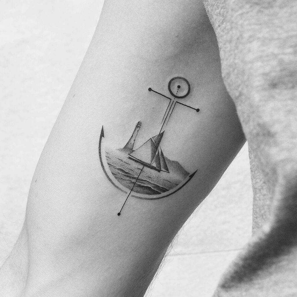 Lighthouse and anchor tattoo by Amanda Piejak