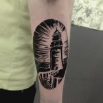 Lighthouse tattoo on a forearm by Eugene Dusty Past
