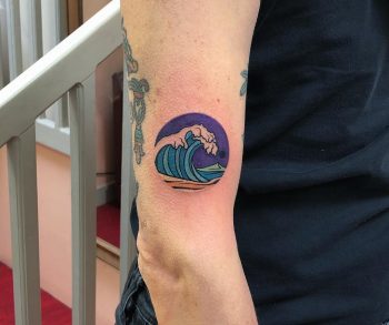 Little tsunami wave tattoo by Eugene Dusty Past