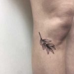 Little twig tattoo by tattooist Spence @zz tattoo