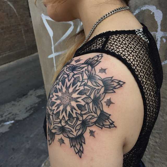 Mandala tattoo on the left shoulder by Tine DeFiore
