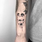 Mask tattoo by Conz Thomas