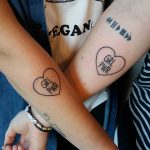 Matching GRL PWR tattoos by Lara Simonetta