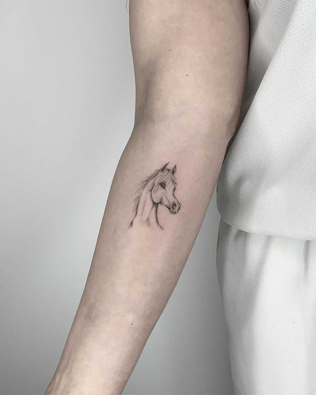 Minimalist horse tattoo by Conz Thomas 