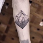 Mountains and trees tattoo by Aki Wong