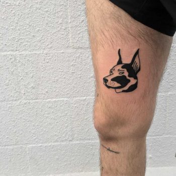 Negative space doberman tattoo by tattooist yeahdope