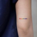 Rainbow dots tattoo by Aki Wong