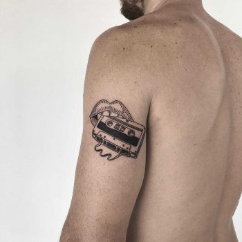 Ruined cassette tape tattoo by Sasha But.maybe