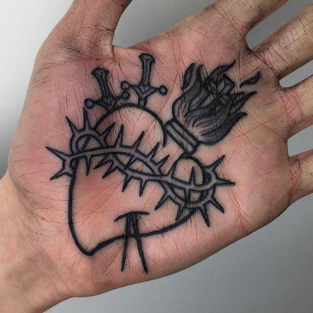 Sacred heart tattoo on a palm by Luke.A.Ashley