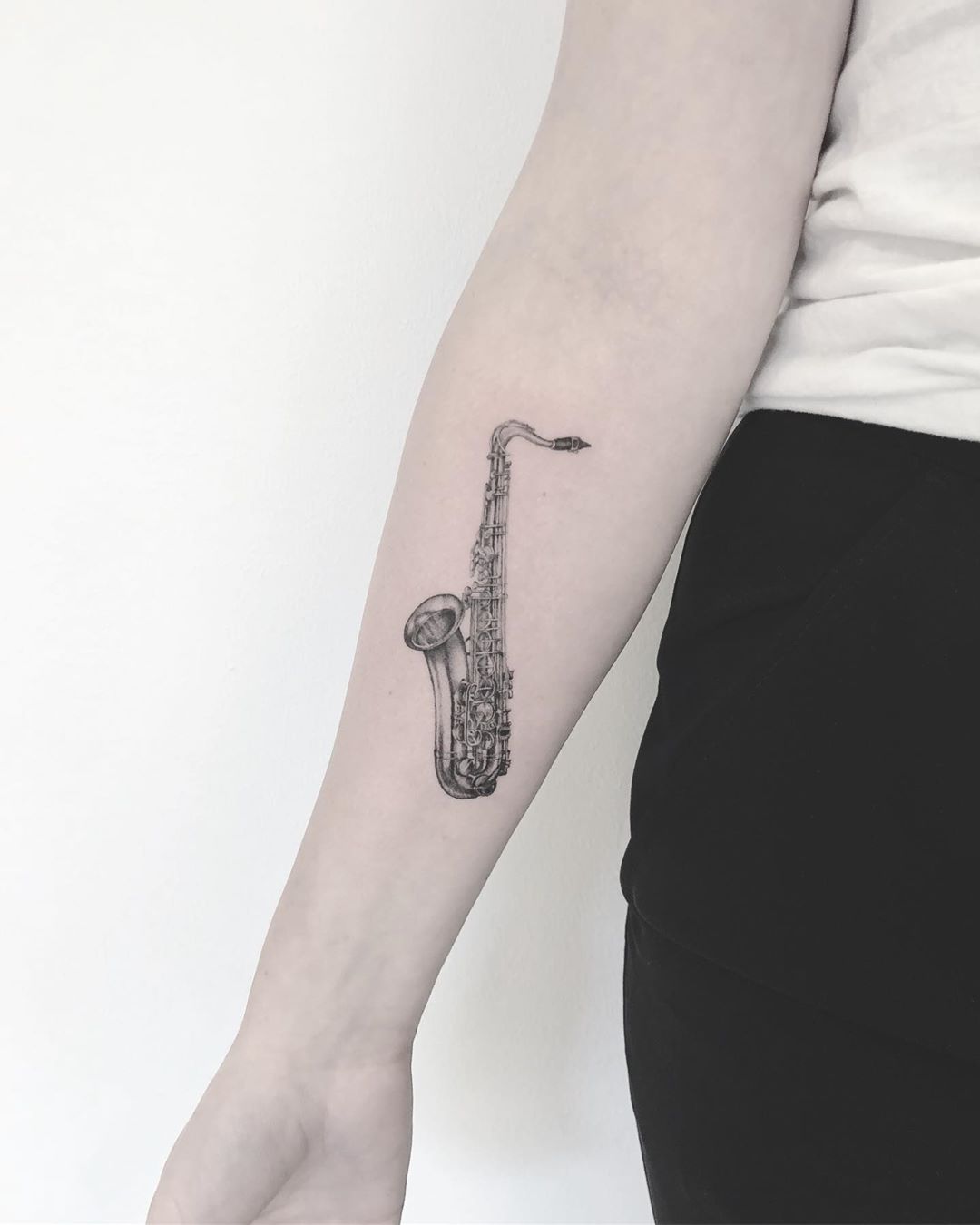Sax tattoo by Annelie Fransson
