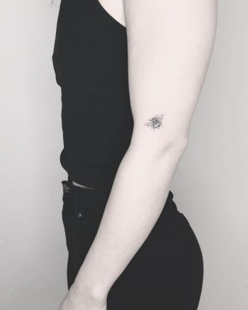 Single needle bee tattoo by Annelie Fransson