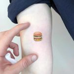 Tiny Big Mac tattoo by Eden Kozo