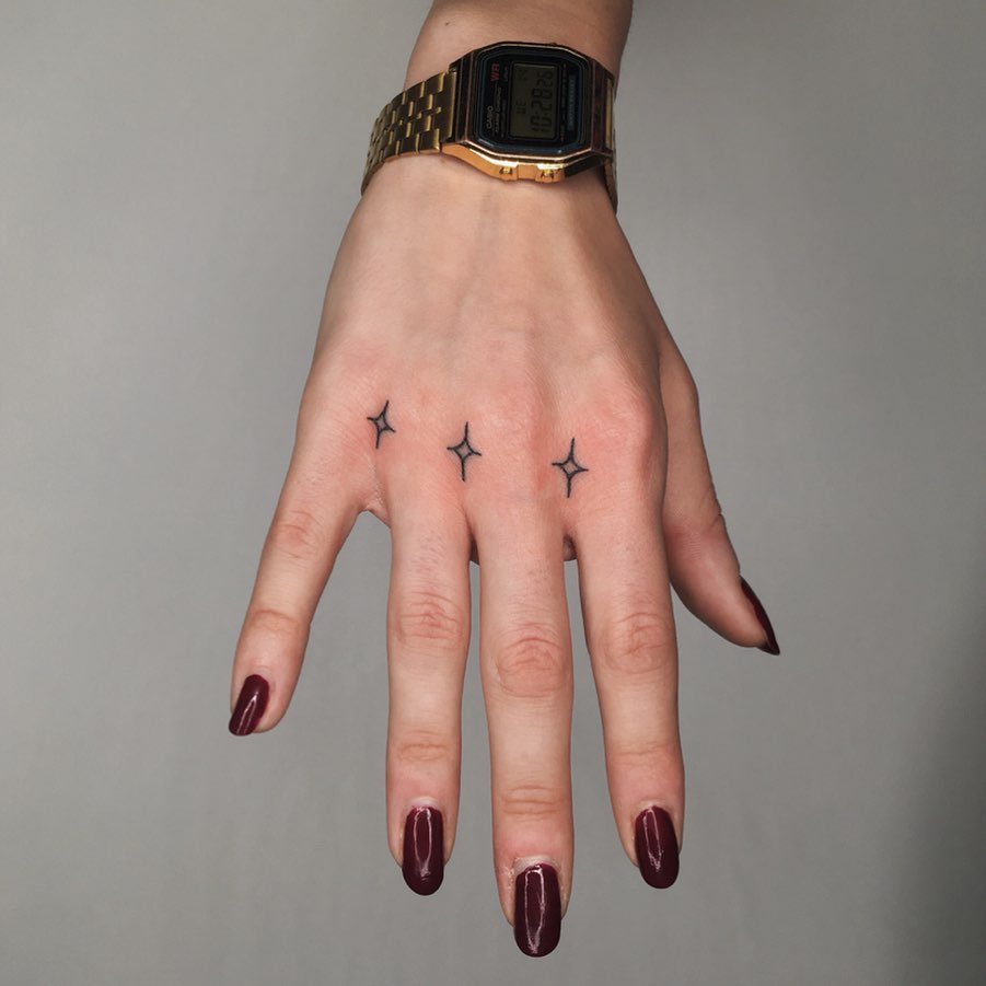 Tiny sparkle tattoos by Jessica Rubbish