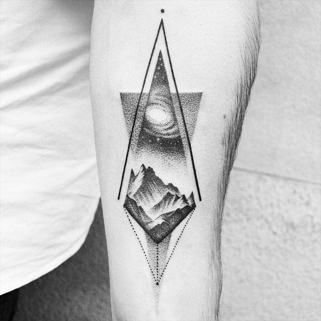 Universe and mountains tattoo by Amanda Piejak