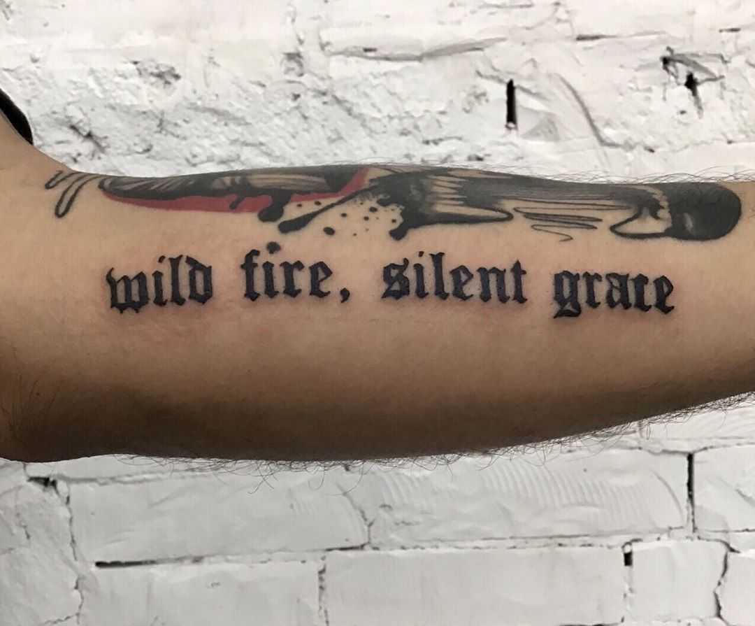 Wild fire, silent grace tattoo by Kevin Jenkins