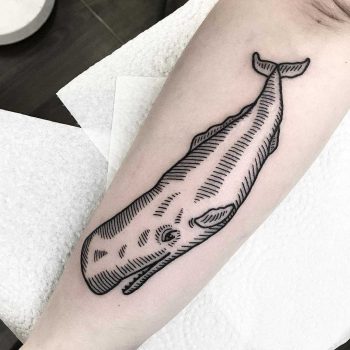 Woodcut whale tattoo by Deborah Pow