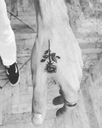 A black rose on a hand by Annelie Fransson